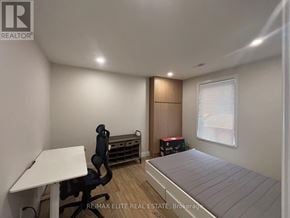 Toronto (Mimico) apartment for rent - A bedroom with a bed, desk, and chair.
