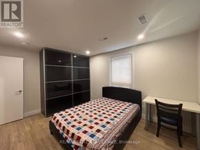 Toronto (Mimico) apartment for rent - A bedroom with a bed, desk, and chair.