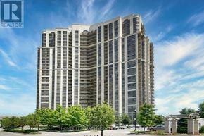 Toronto (West Humber-Clairville) condo for rent - A tall residential building with a clear blue sky in the background.