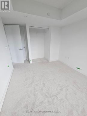 Toronto (Yorkdale-Glen Park) condo for rent - A white room with a doorway leading to another room.