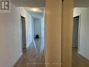 Toronto (Church-Yonge Corridor) condo for rent - A hallway with a dog sitting on the floor.