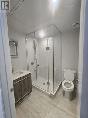 Toronto (Annex) condo for rent - A bathroom with a toilet, sink, and shower.