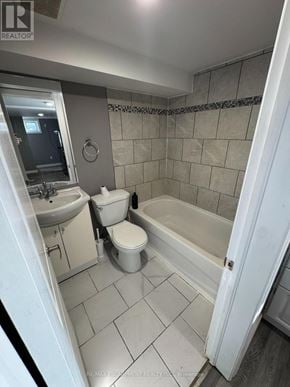 Barrie (Wellington) apartment for rent - A bathroom with a toilet, sink, and bathtub.