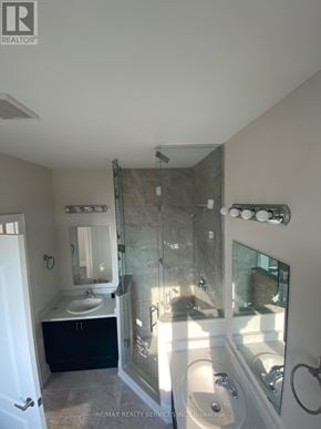 Orillia apartment for rent - A bathroom with a walk in shower and a sink.