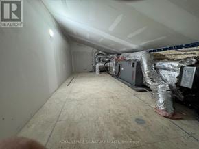 Hamilton (Gilkson) apartment for rent - A room with a lot of duct tape and pipes.