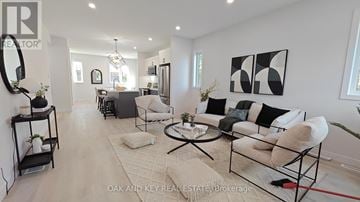London North (North C) townhouse for rent - A living room with a white couch and a coffee table.