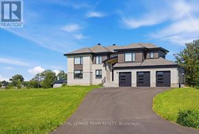 Ottawa apartment for rent - A large house with a driveway in front of it.