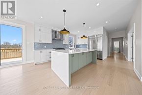 Ottawa apartment for rent - A spacious kitchen with a large island in the middle.
