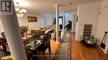 Vaughan (Maple) apartment for rent - A well-lit dining room with a table set for six.