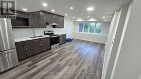 Ajax (Northwest Ajax) apartment for rent - A kitchen with wooden floors and stainless steel appliances.