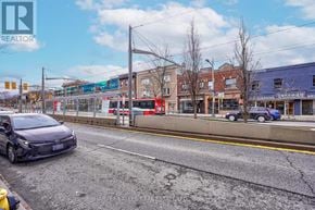 Toronto (Oakwood Village) multi-family for rent - A street view with a car parked on the side of the road.