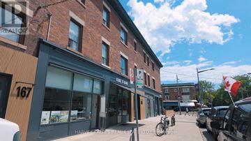 Toronto (Oakwood Village) multi-family for rent - A street view of a building with the number 167 on it.