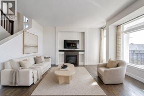 Coquitlam apartment for rent - A living room with a fireplace and a couch.