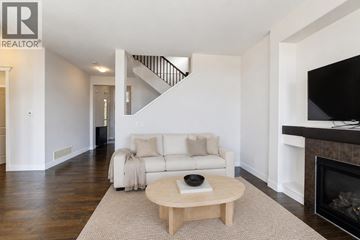 Coquitlam apartment for rent - A living room with a white couch and a coffee table.