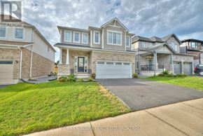Fort Erie (Ridgeway) apartment for rent - A row of houses with a driveway in front.