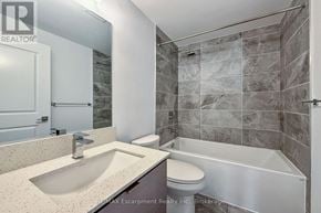 Mississauga (Fairview) condo for rent - A bathroom with a sink, toilet and bathtub.