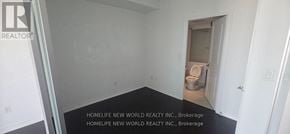 Toronto (Bay Street Corridor) condo for rent - A room with a toilet in the hallway of a building.