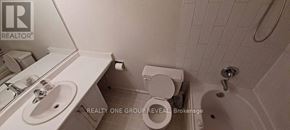 Toronto (Elms-Old Rexdale) condo for rent - A white bathroom with a toilet, sink, and bathtub.