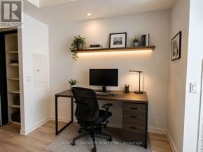 Toronto (Mount Pleasant West) condo for rent - A home office with a desk, chair, and shelves.