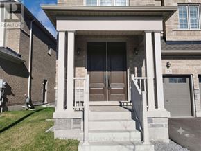 East Gwillimbury (Holland Landing) apartment for rent - A house entrance with a brown door and a white porch.