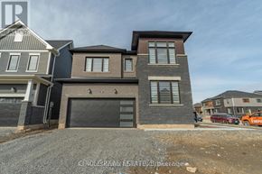 Thorold (Hurricane/Merrittville) apartment for rent - A modern two-story house with a garage is shown in the image.