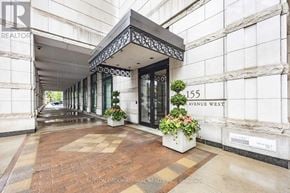 Toronto (Casa Loma) condo for rent - The entrance to a building with a sign that reads "Avenue West".