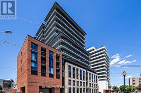 Hamilton (Beasley) condo for rent - A modern building with a sign that reads RE/MAX Imperial Realty.