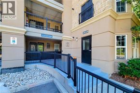 Burlington condo for rent - A building with a sign that says "REALTOR" on the left side.