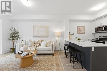 Lincoln (Lincoln Lake) condo for rent - A modern living room with a white couch and a wooden coffee table.