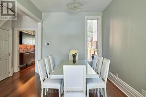 Ottawa townhouse for rent - A dining room with a white table and chairs.