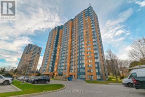 Toronto (Milliken) condo for rent - A tall building with a blue and orange facade is the main focus of the image.