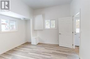 Sault Ste. Marie apartment for rent - A room with a white door and a window with a white frame.