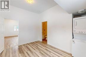 Sault Ste. Marie apartment for rent - A room with a washing machine on the right side.