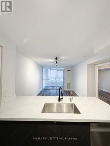 Toronto (Bendale) condo for rent - A modern kitchen with a sink and a window.