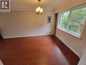 Burnaby apartment for rent - A room with wooden flooring and a window.