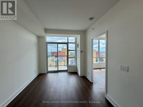 Toronto (West Humber-Clairville) condo for rent - A room with a sliding door leading to a balcony.