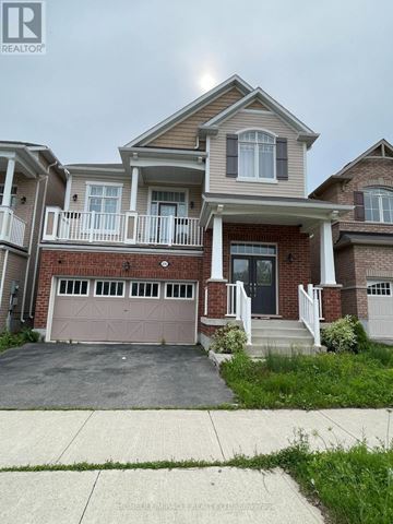 Kitchener apartment for rent - A house with a garage and a balcony is for sale.