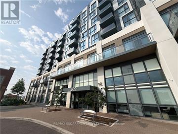 Oakville (Go Glenorchy) condo for rent - A modern building with the number 509 on it.