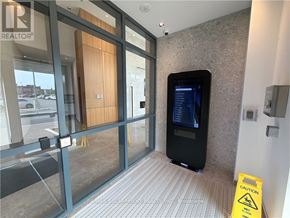 Oakville (Go Glenorchy) condo for rent - A black tablet is on display in a glass case in a realtor's office.