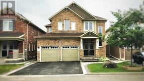Brampton (Northwest Brampton) apartment for rent - A brick house with a garage is for sale.