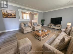 Burlington (Lasalle) apartment for rent - A living room with a couch, chair, and coffee table.