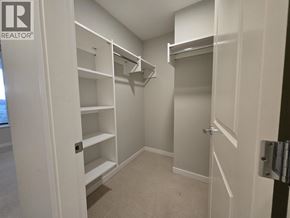 Vancouver apartment for rent - A white doorway leads to a small, empty room with shelves.