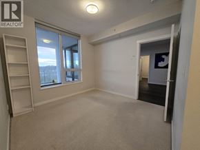 Vancouver apartment for rent - A room with a window and a ladder in it.