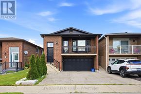 Vaughan (East Woodbridge) apartment for rent - A two-story brick house with a garage and a car parked in front.