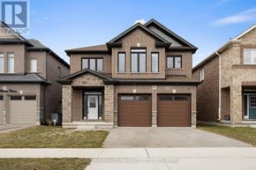 Cambridge apartment for rent - A large brick house with a garage is for sale.