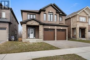Cambridge apartment for rent - A large brick house with a garage is for sale.
