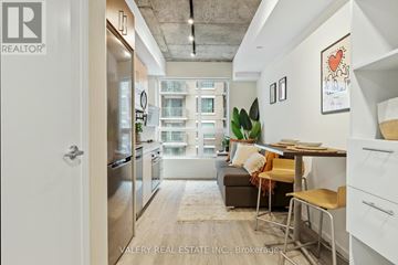 Ottawa condo for rent - A modern kitchen with a view of the city.