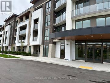 Oshawa (Windfields) condo for rent - A building with the sign "REALTOR" on the top left corner.
