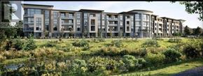 Oshawa (Windfields) condo for rent - A row of modern apartment buildings are shown in the image.