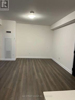 Oakville (Jm Joshua Meadows) condo for rent - A room with wooden flooring and white walls.